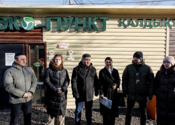 a group of people standing in front of a building