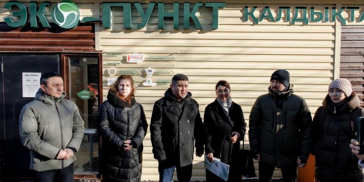 a group of people standing in front of a building